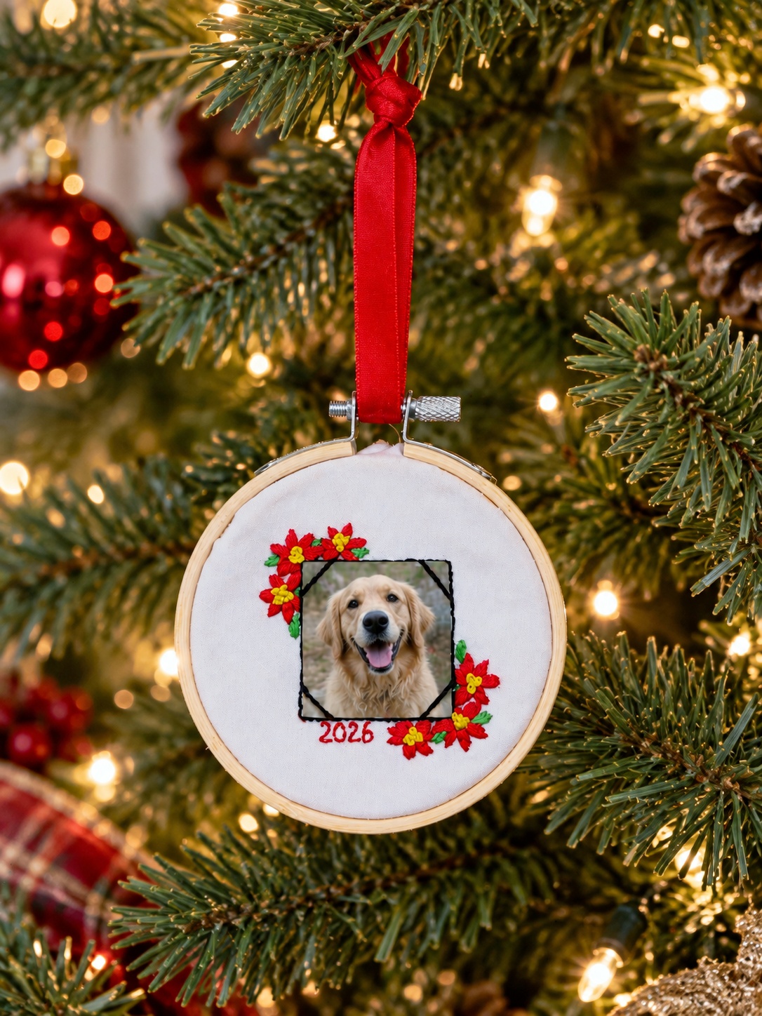Hang a handmade photo ornament on the Christmas tree and keep the memory forever Finished family photo ornament hanging from a Christmas tree with warm holiday lights