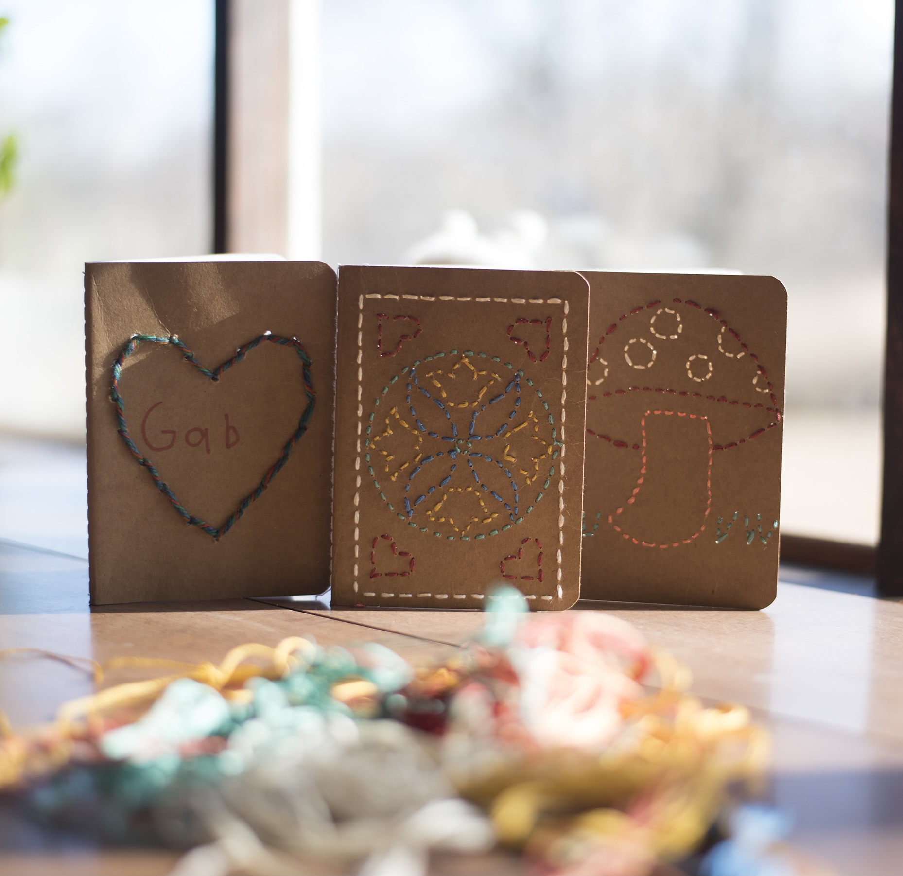 Past project: Stitched Notebooks made by children using our craft kits