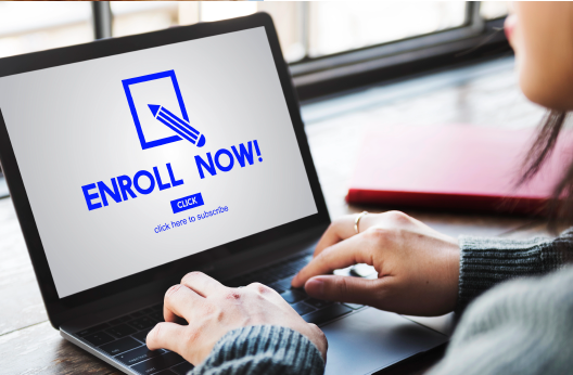 Parent registering a child for after-school activities on a laptop