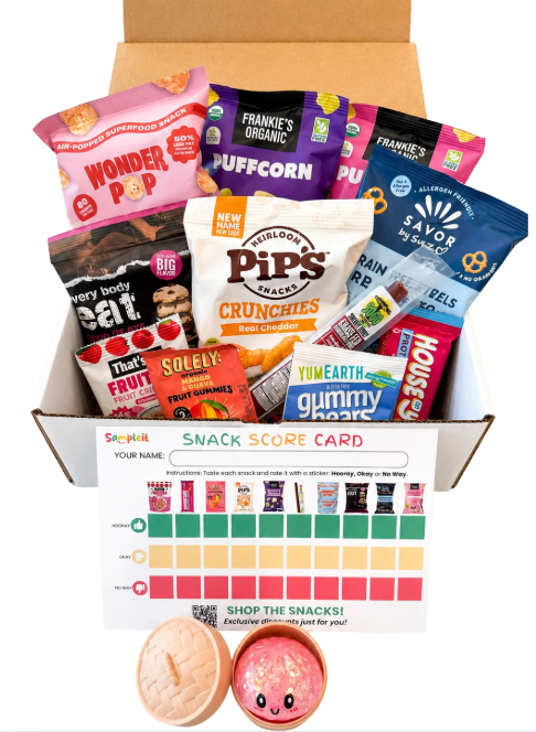 Sampleit snack box with pink dumpling, snack score card, and better-for-you snacks