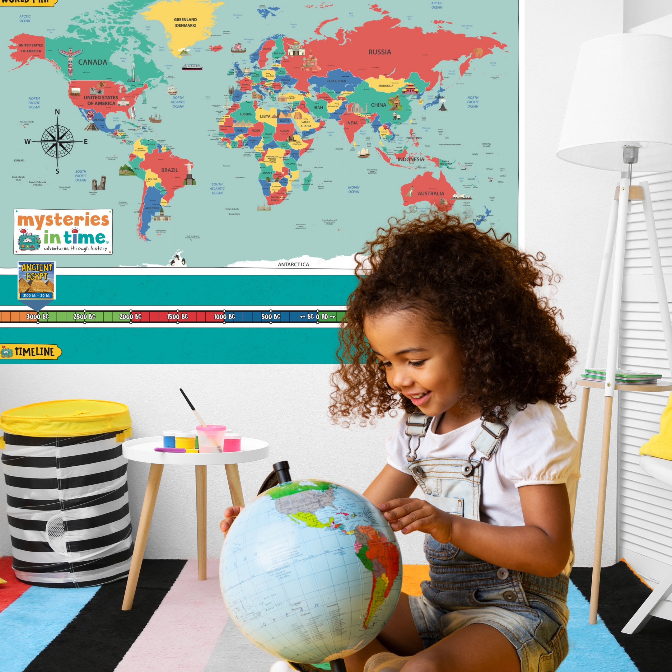 Girl playing with globe