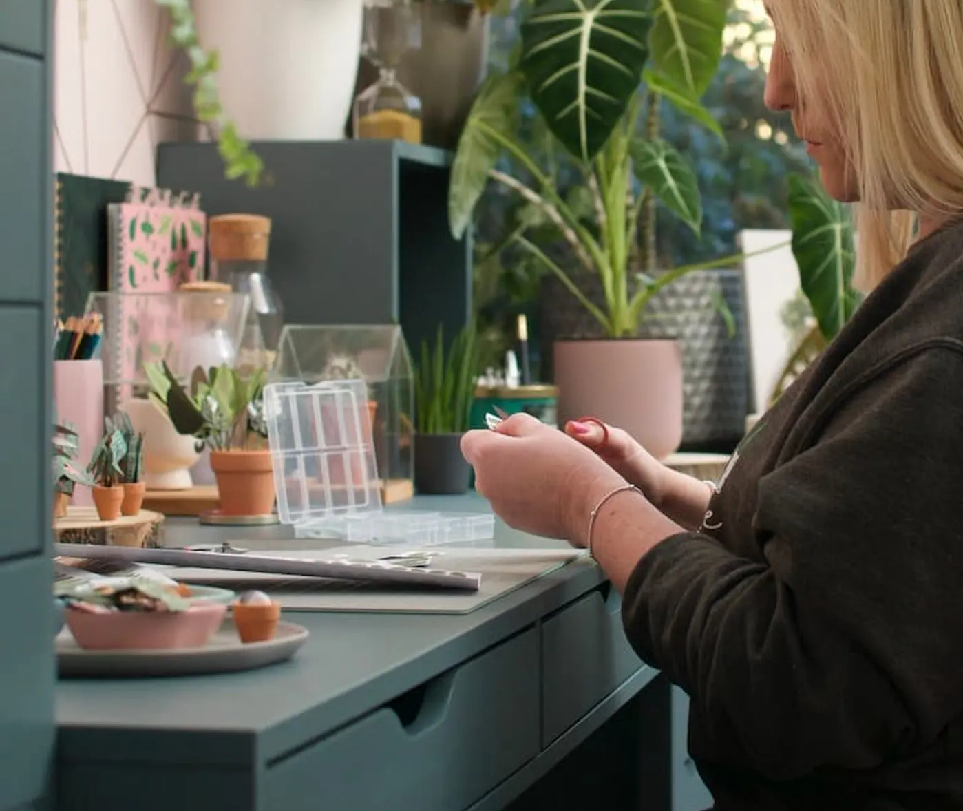 Crafter working on paper plants