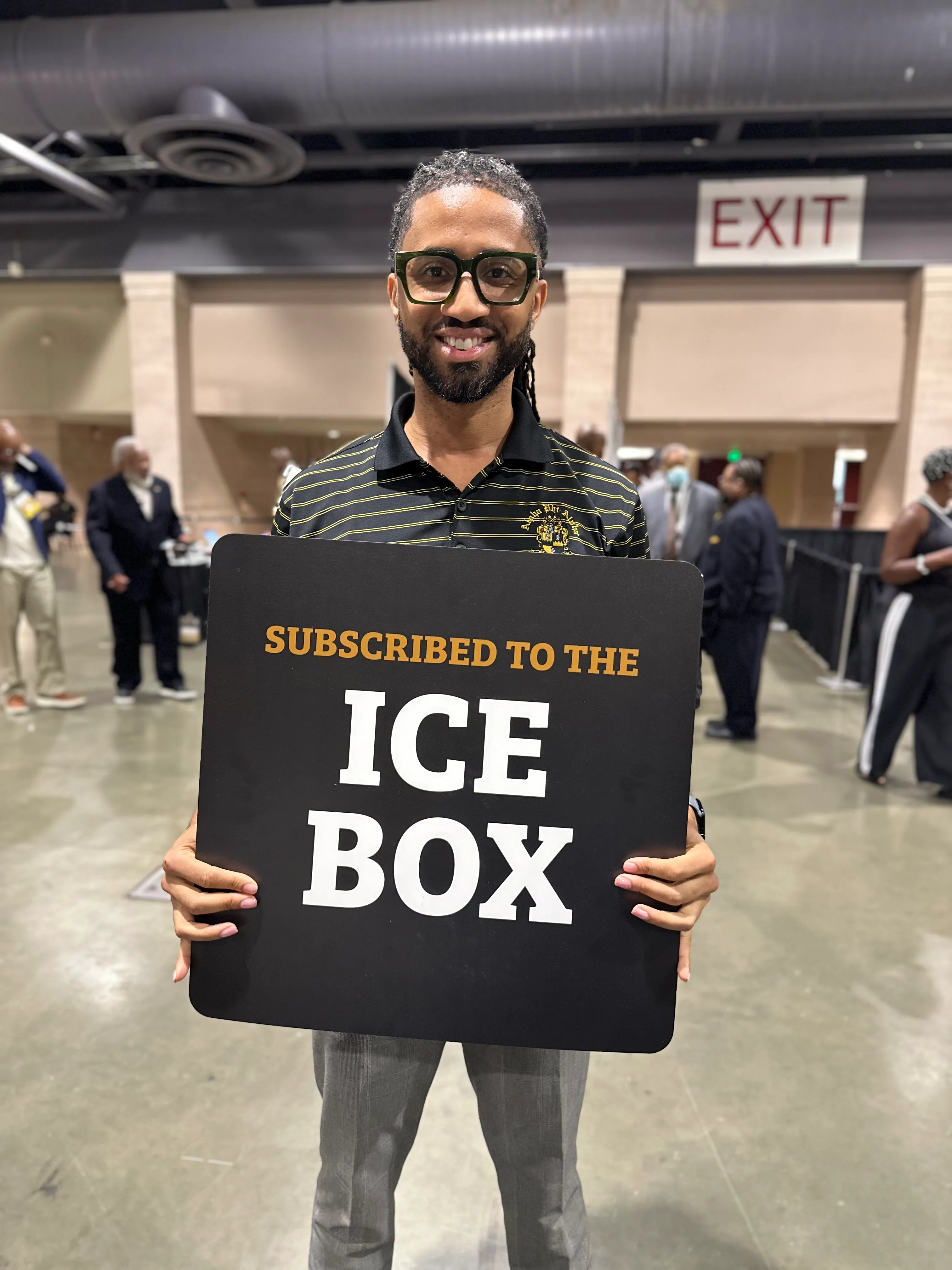 Alpha Traditions community member enjoying curated fraternity lifestyle products outdoors