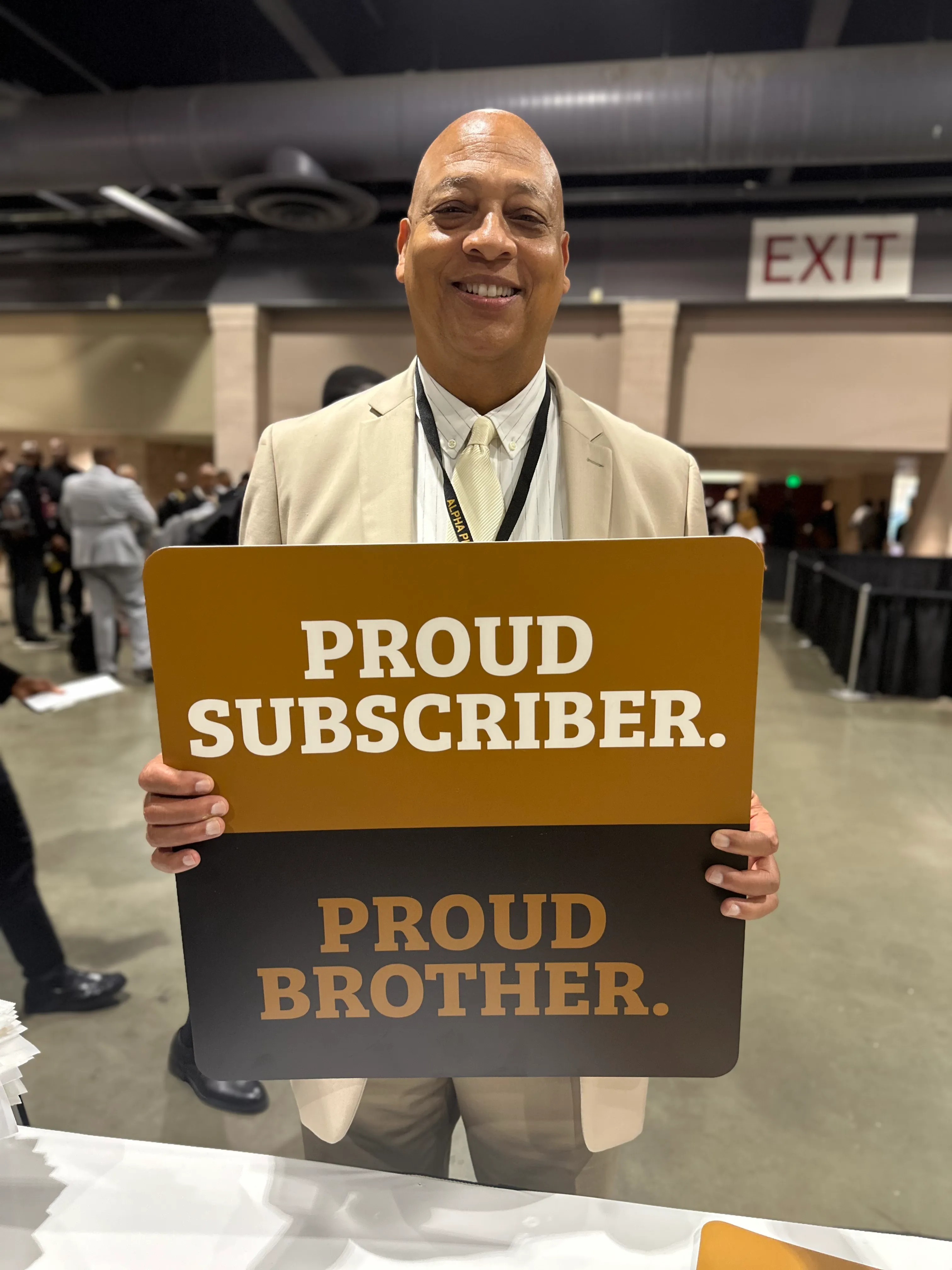 Customer displaying Alpha Traditions accessories highlighting fraternity heritage and pride