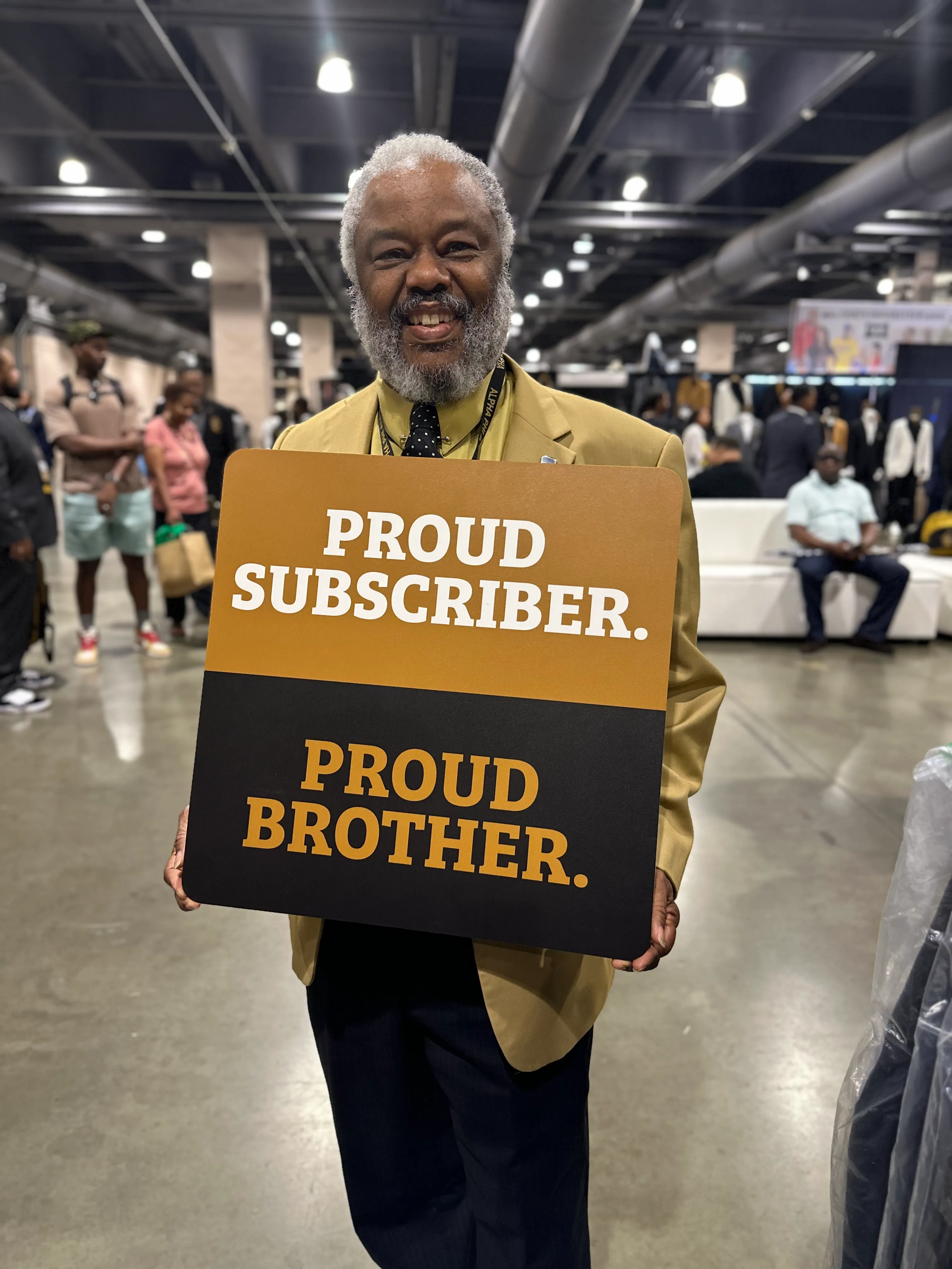 Customer representing Alpha Traditions fraternity lifestyle at an alumni homecoming event