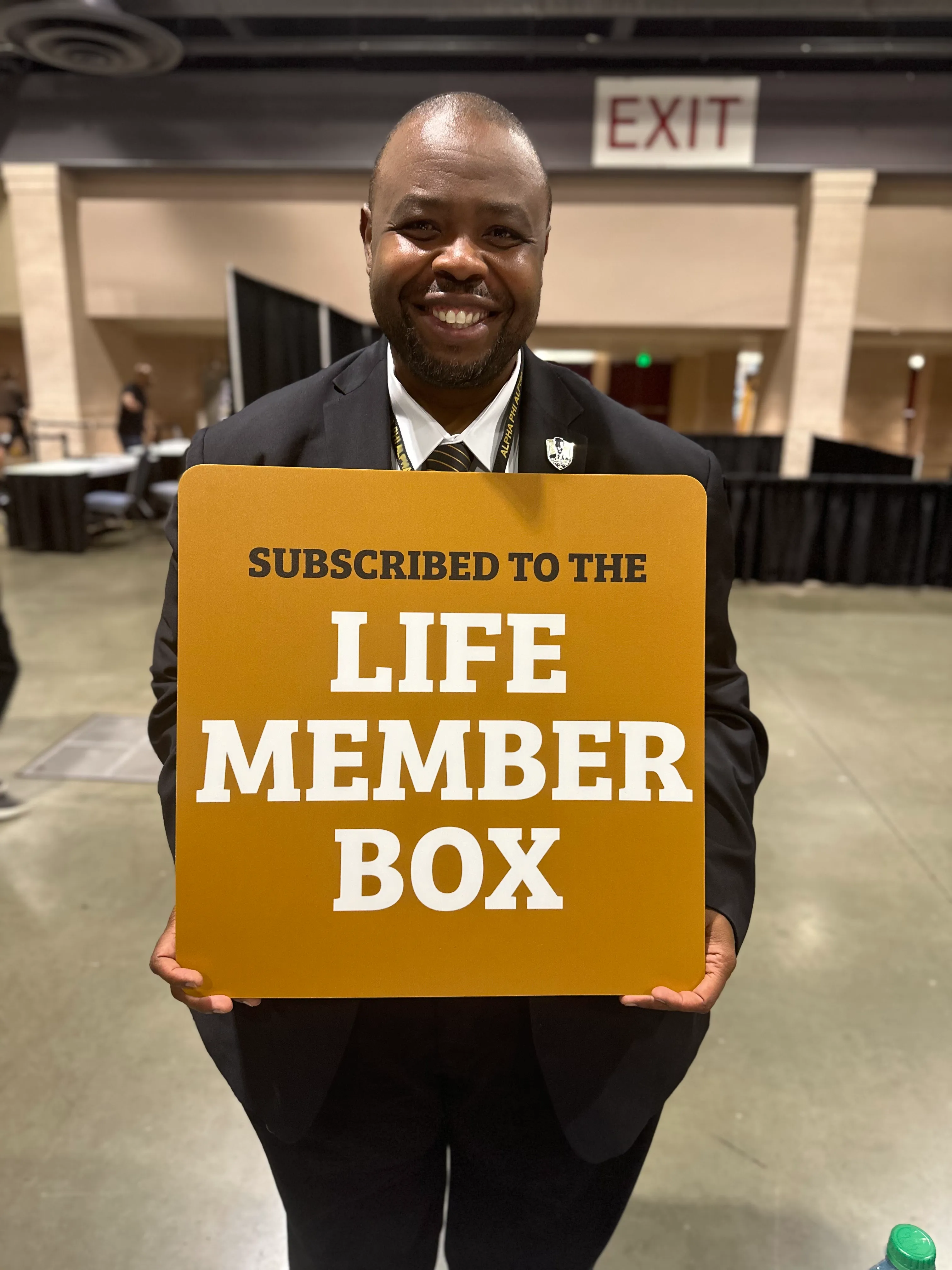Alpha Phi Alpha member showcasing Alpha Traditions heritage-inspired fraternity gear