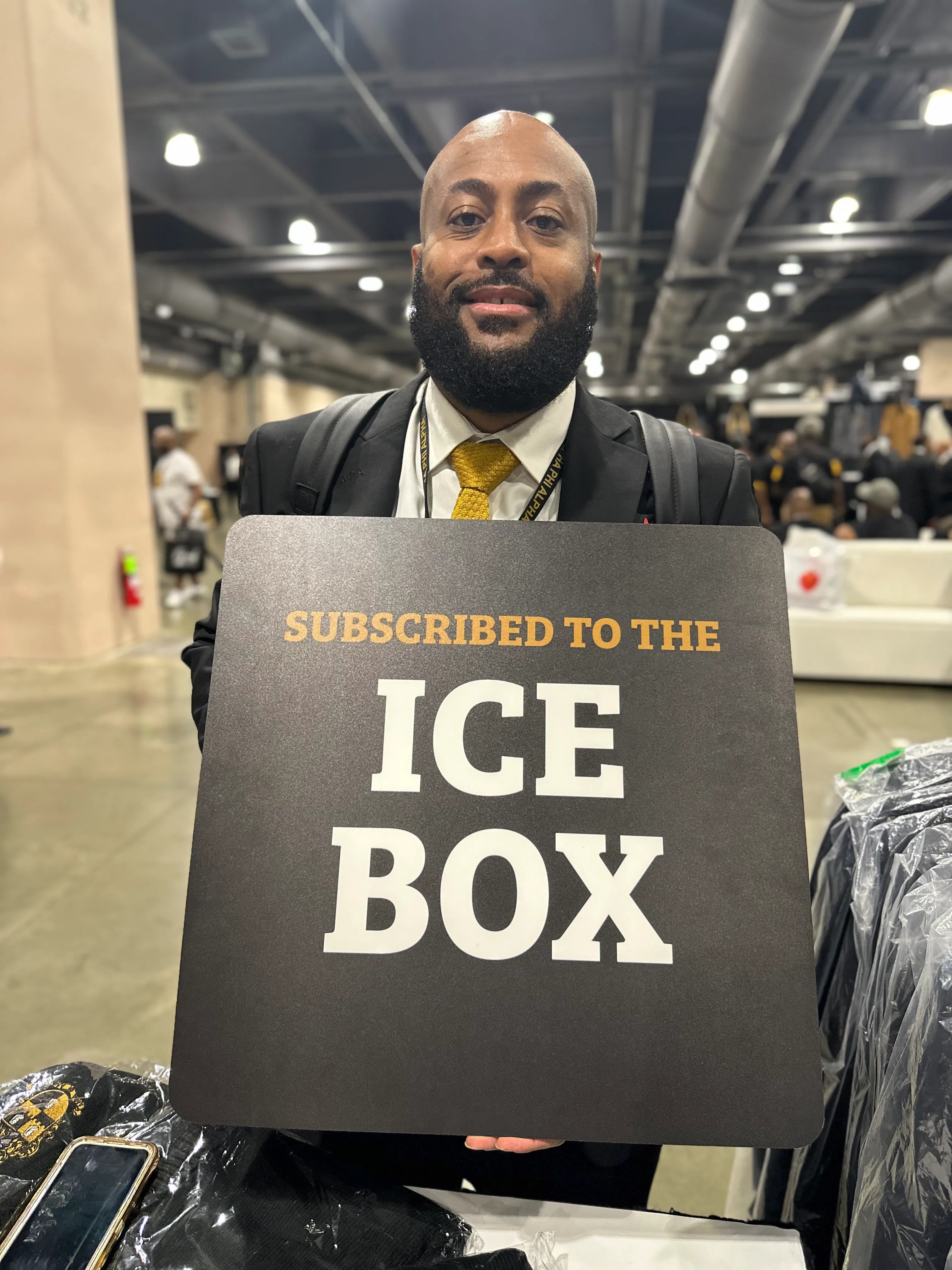 Group of Alpha Phi Alpha brothers united in Alpha Traditions matching collection pieces