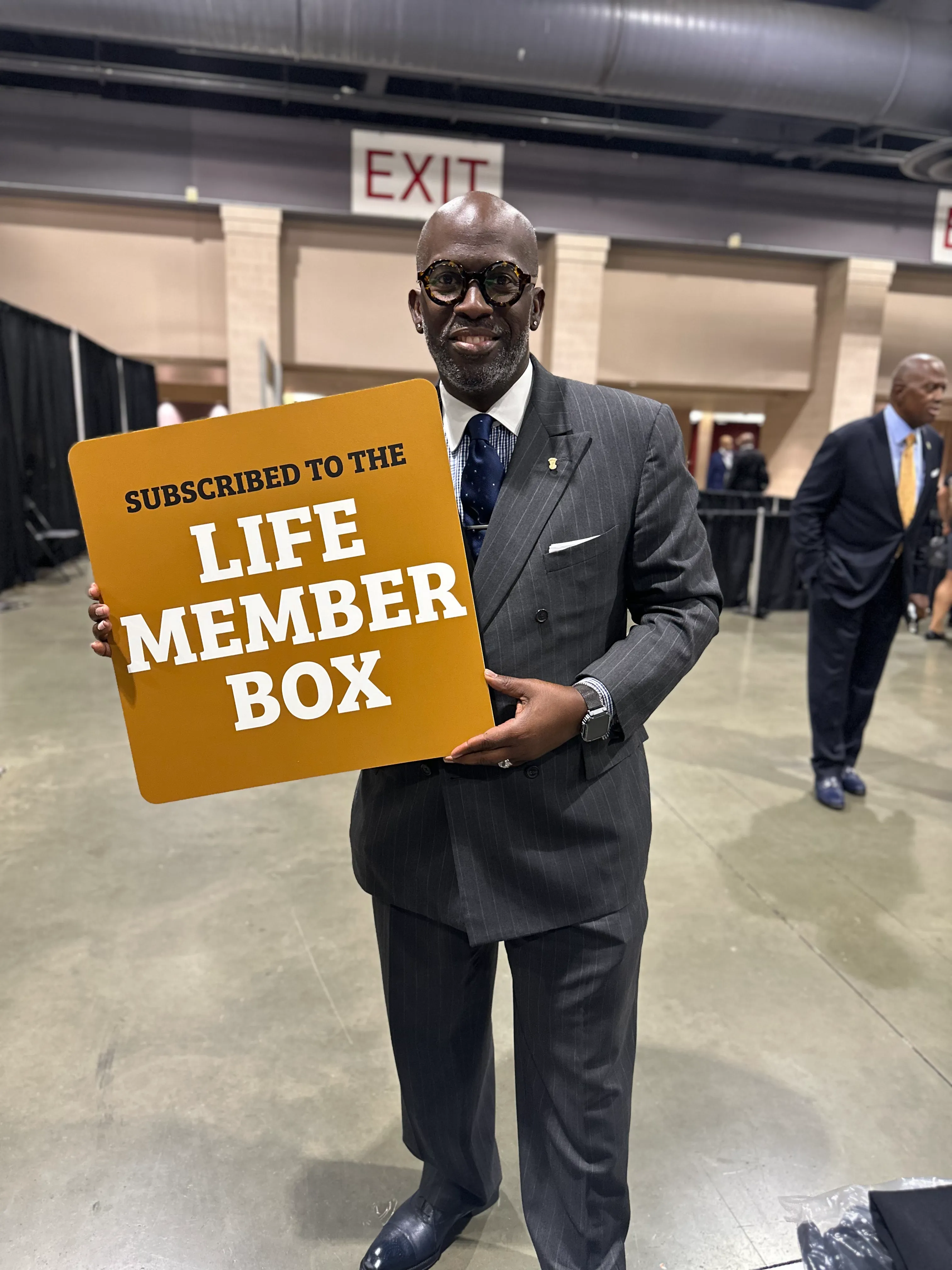 Alpha Traditions customer wearing fraternity crewneck at a brotherhood leadership summit