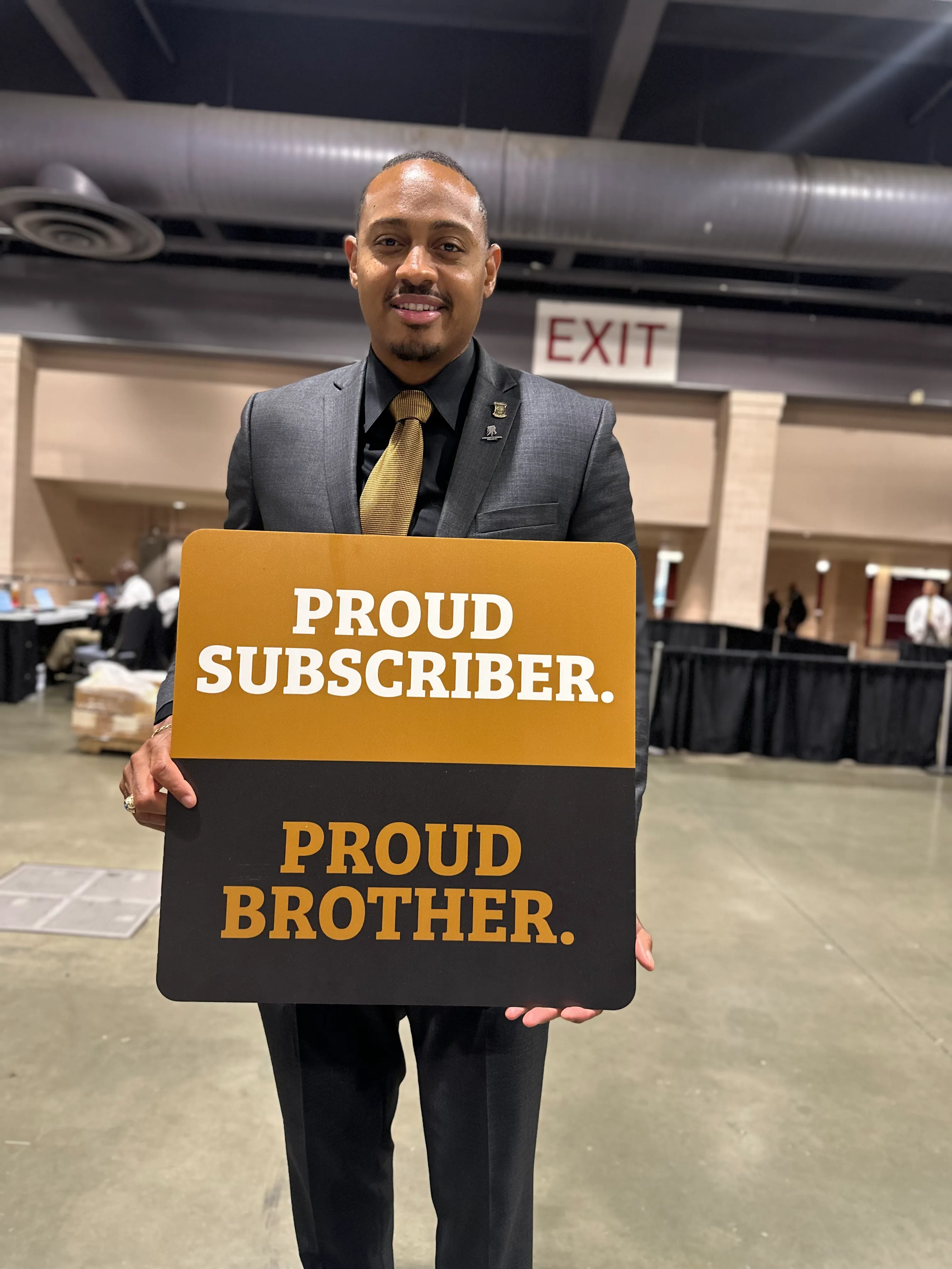 Alpha Traditions customer sporting fraternity branded streetwear at a social gathering