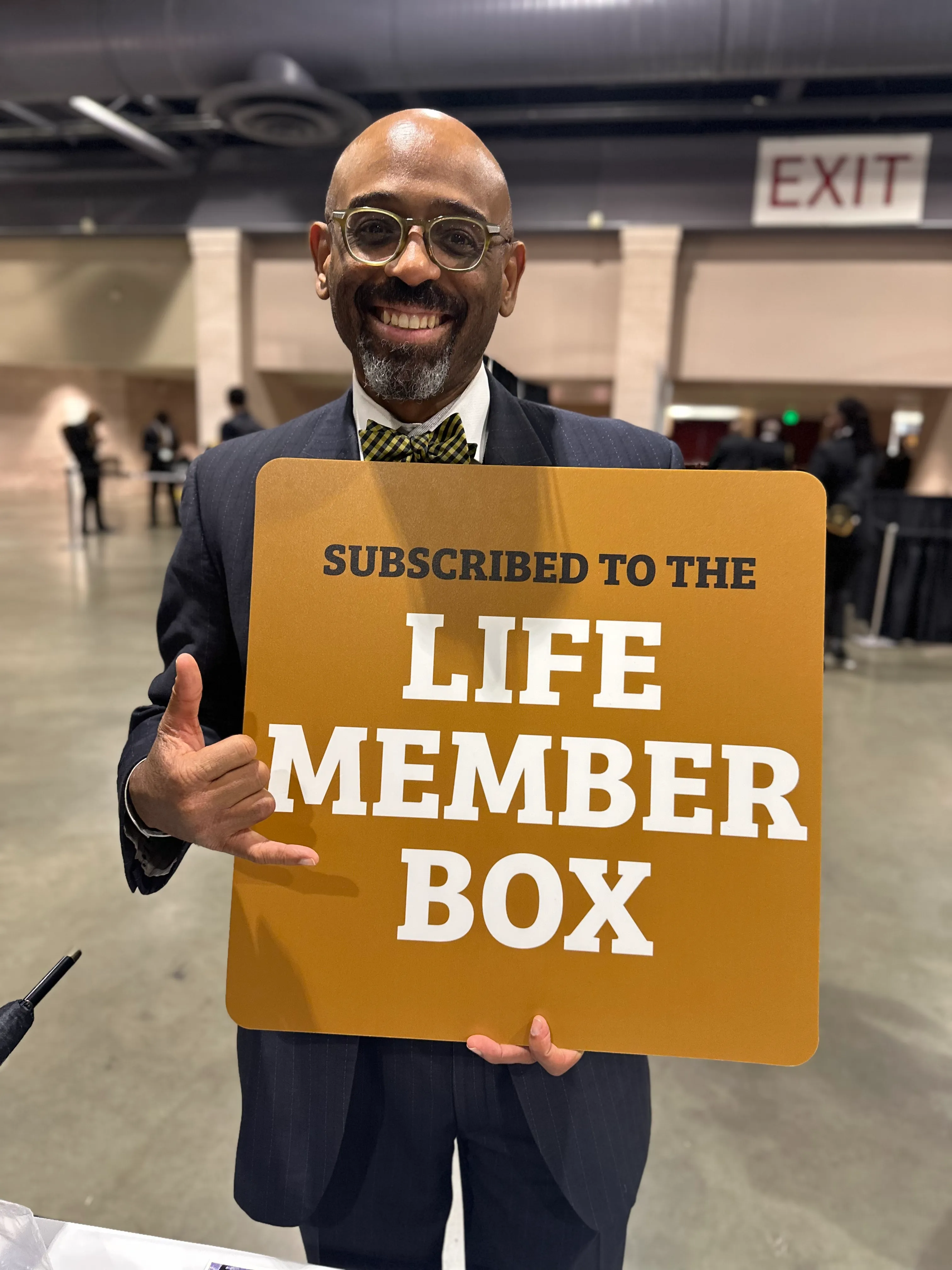 Alpha Traditions member representing fraternity excellence with curated seasonal apparel