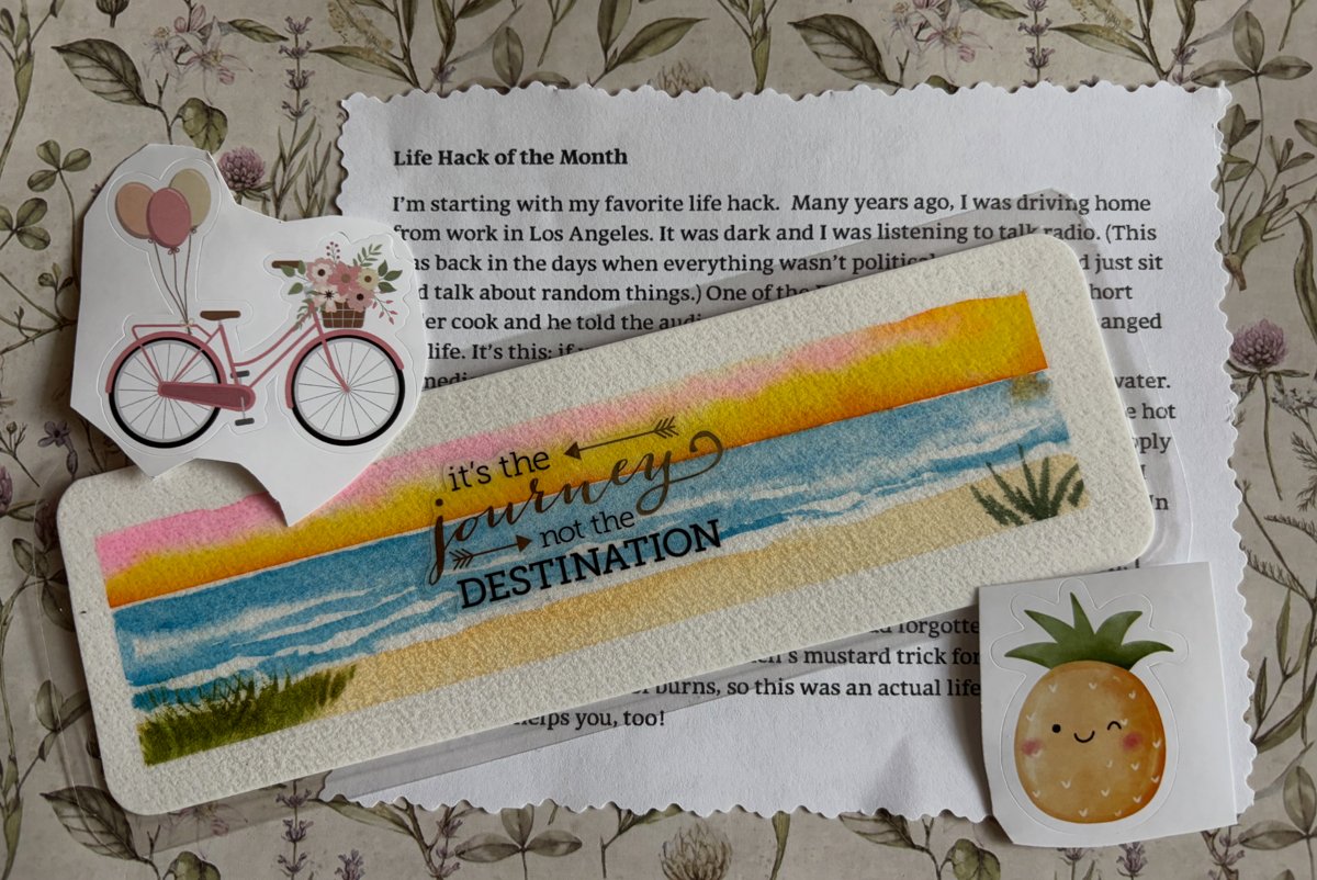 A life hack card tucked inside a happy mail envelope