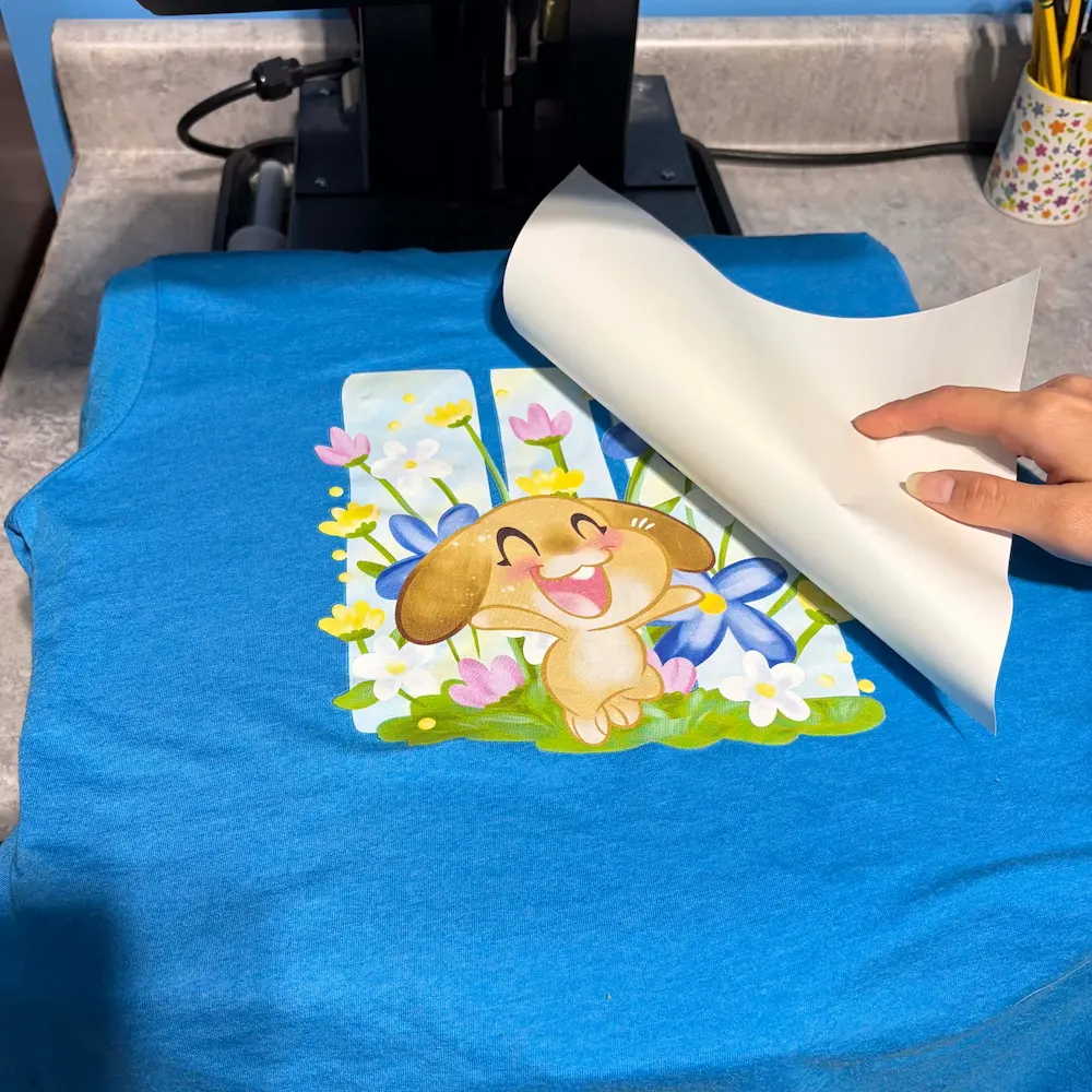 Heat pressing design onto t-shirt