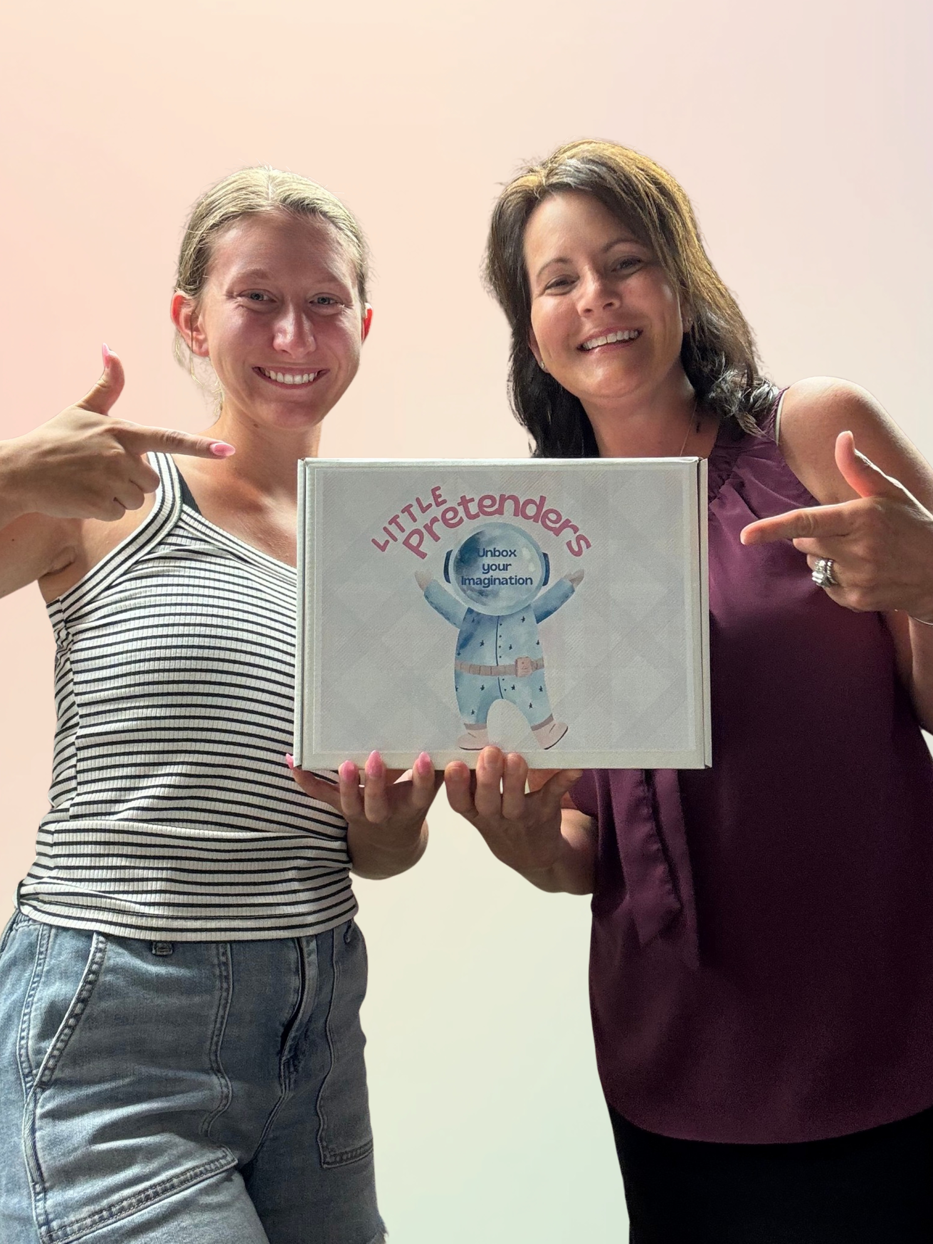 Jennifer and Cambry, mother-daughter founders of Little Pretenders subscription box, smiling together