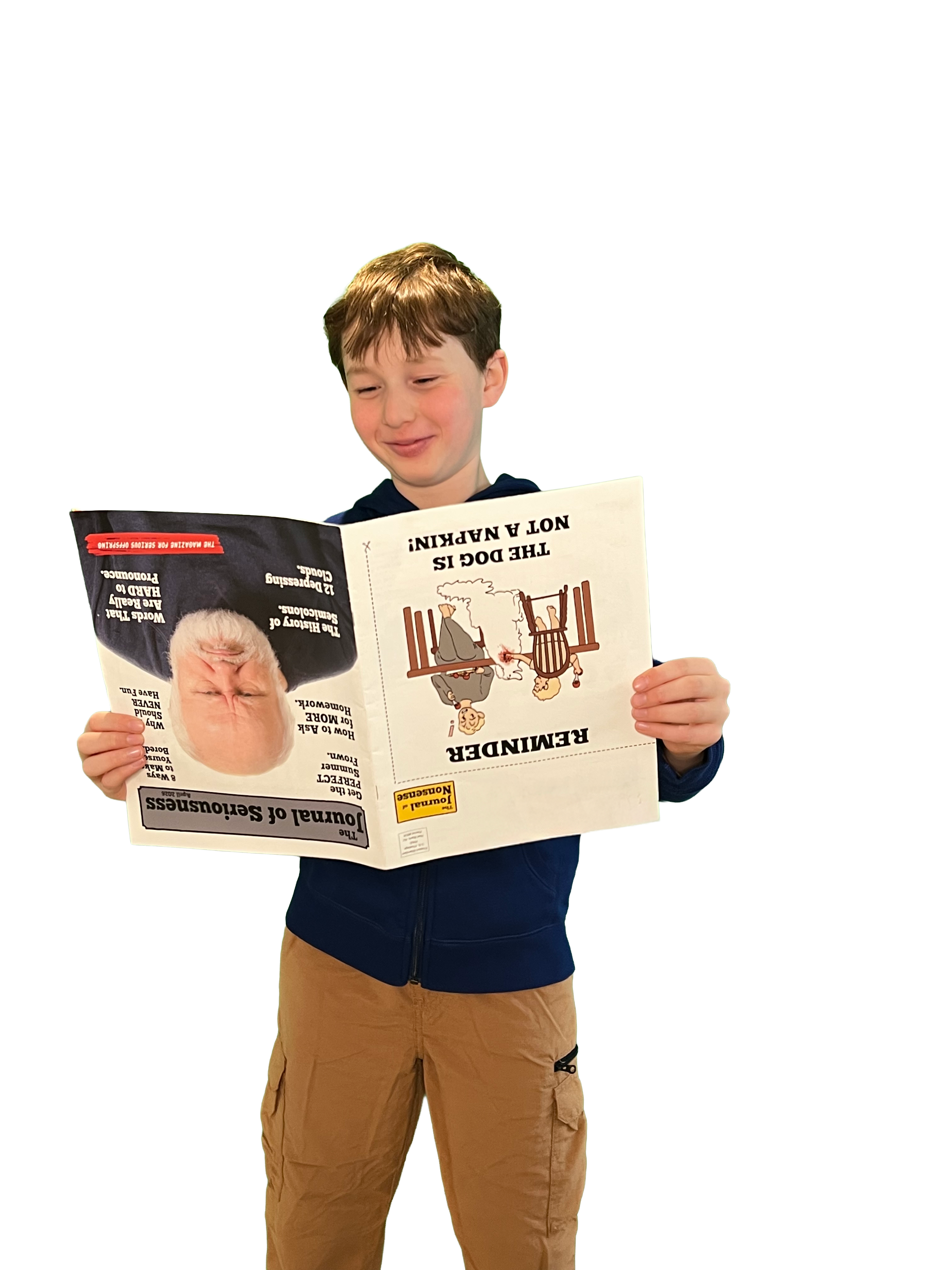 Kid smiling at magazine