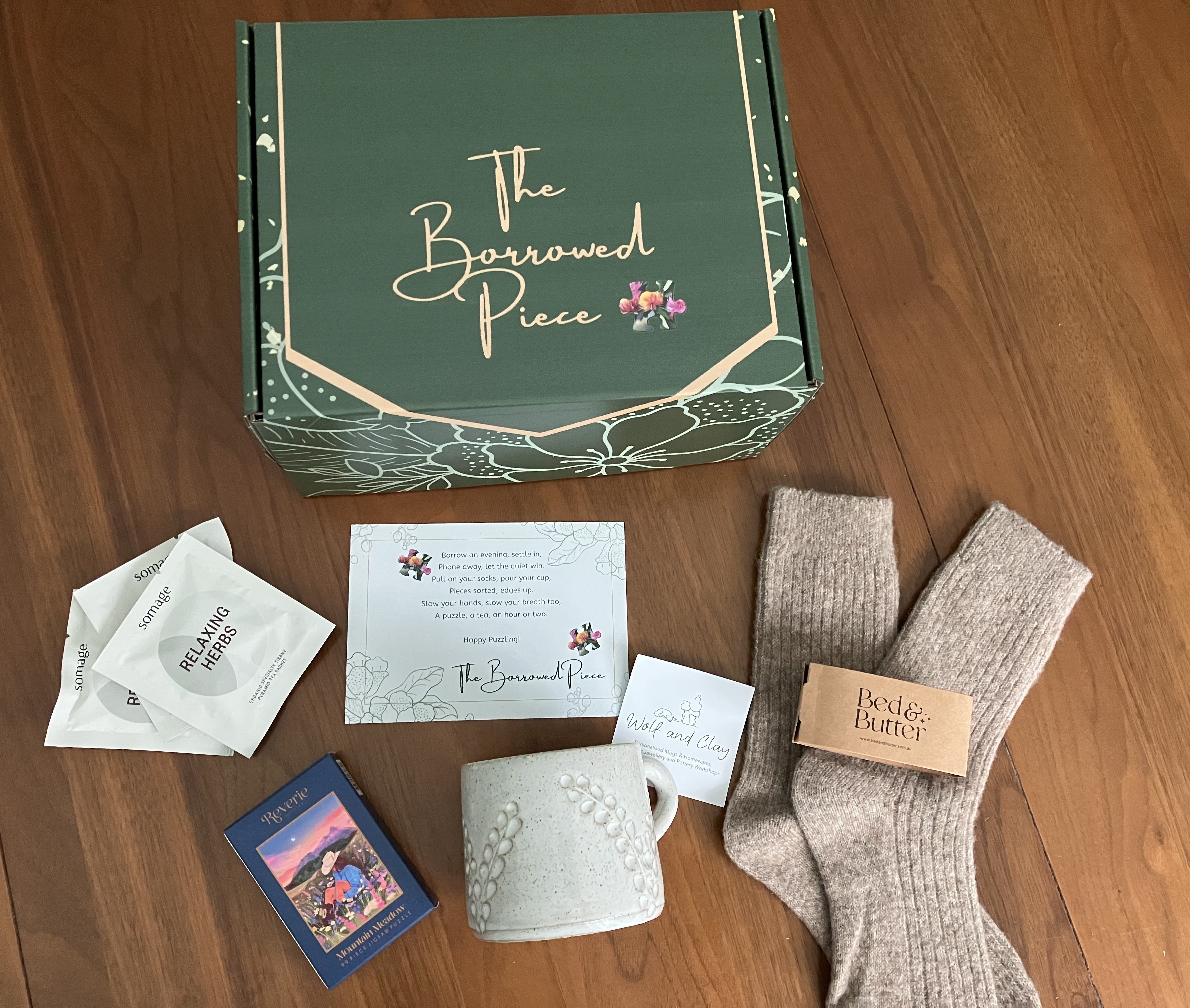 The Anniversary Box closed, resting on a wooden surface