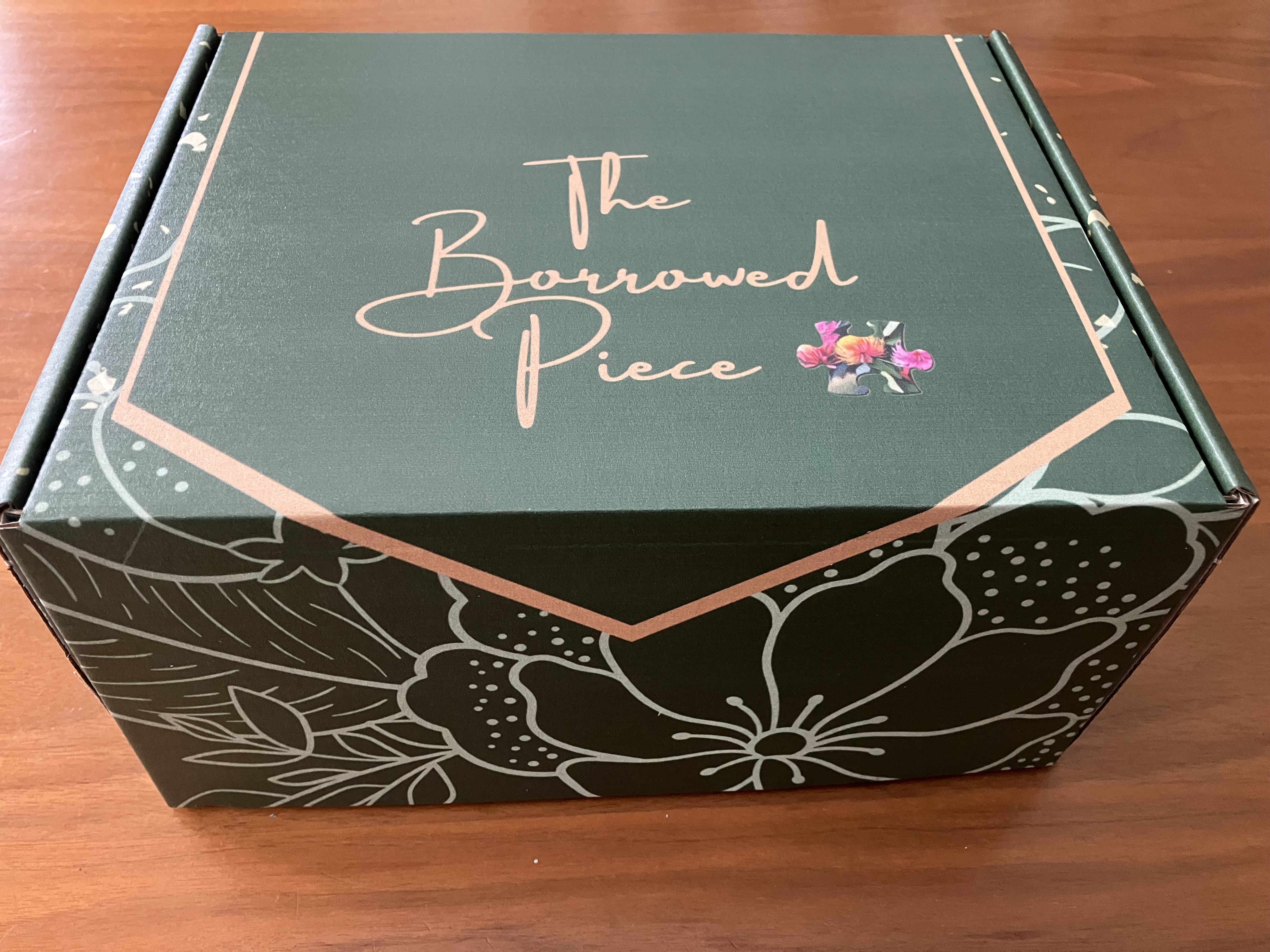 The Anniversary Box flatlay showing the box and all contents laid out