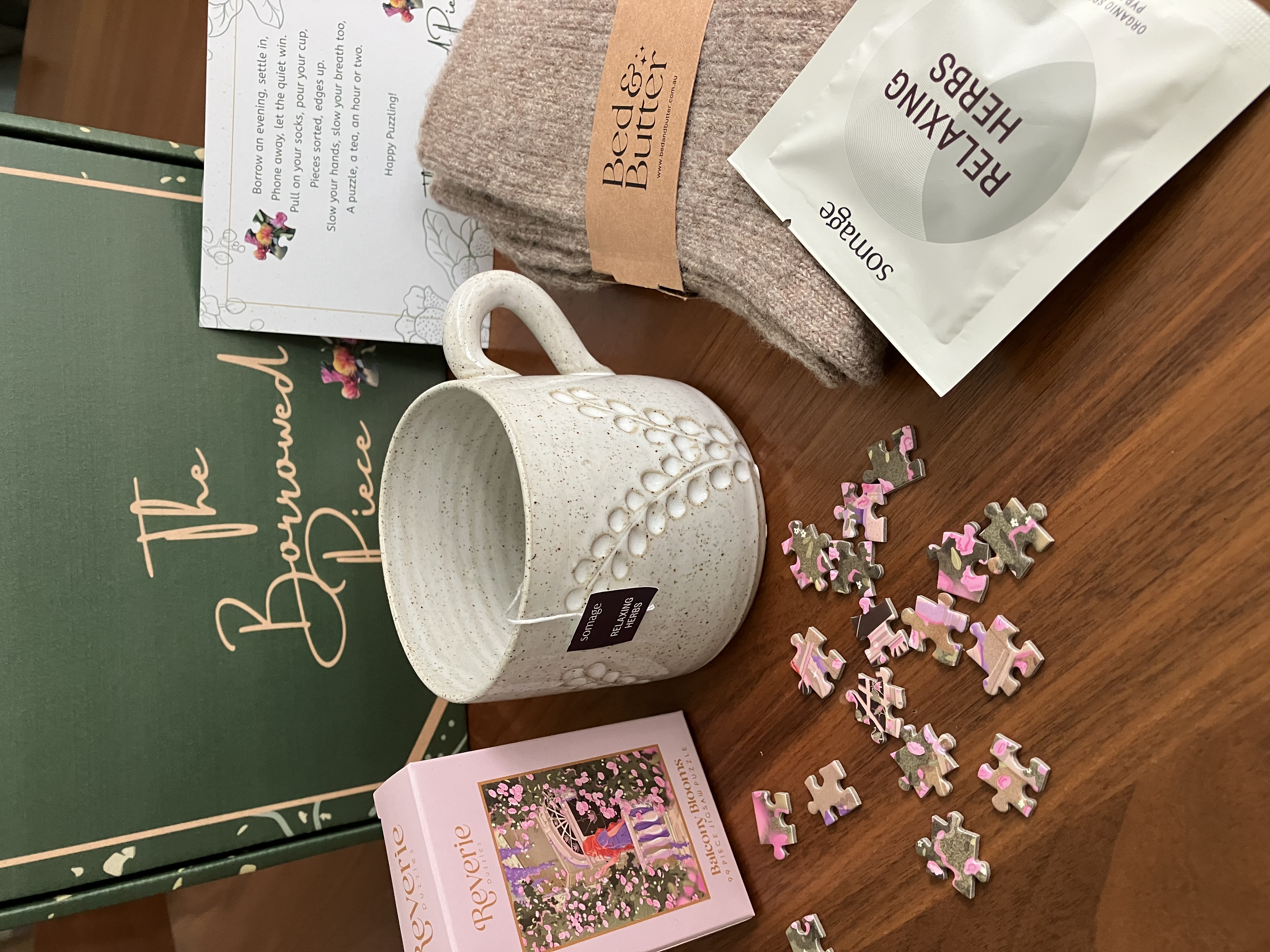 The Anniversary Box opened, tissue paper and contents visible