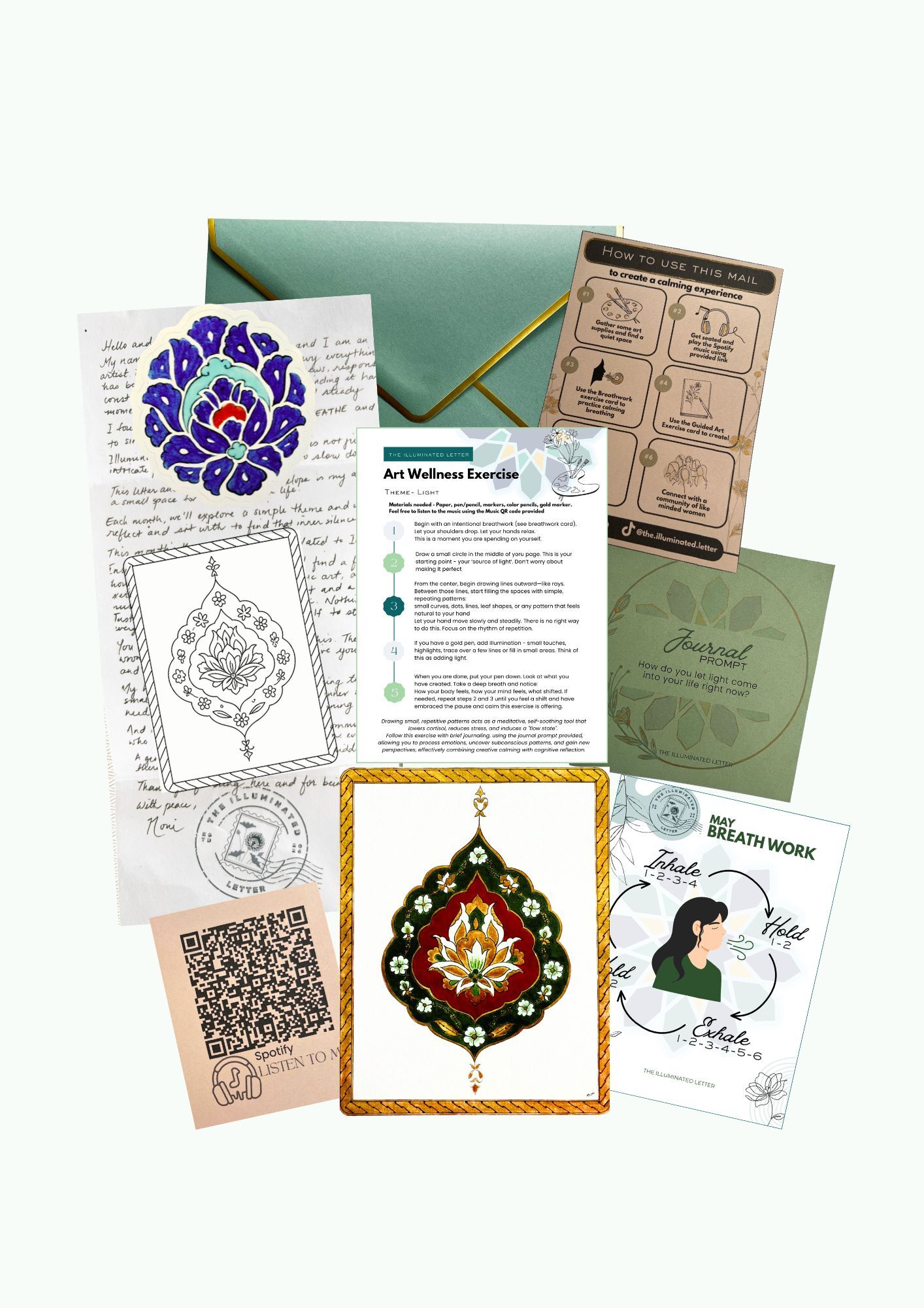 The contents of June's Illuminated Letter — a curated arrangement of cards, a handwritten note, a coloring page, an art print, a playlist card and a breathwork guide.