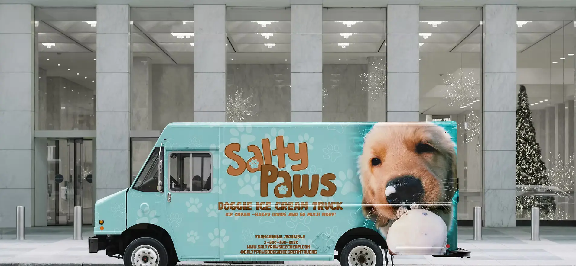 Salty Paws doggie ice cream truck with a dog enjoying a cone